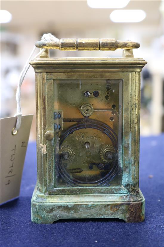 A gilt brass carriage clock by Henri Jacot, in leather travelling case, (a.f.)